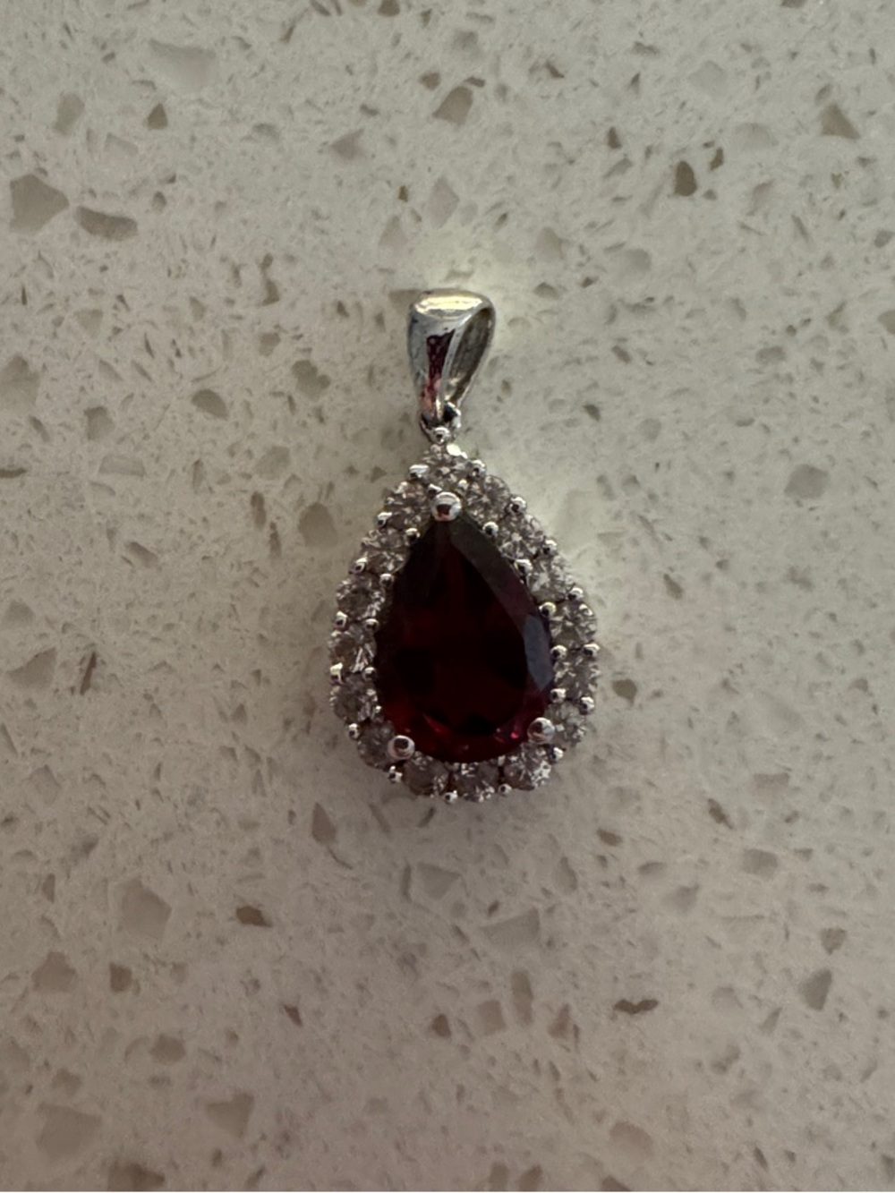 Sterling Silver Ruby Teardrop Pendant with CZ Halo